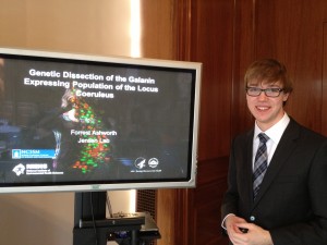 Forrest presenting his research at another competition.